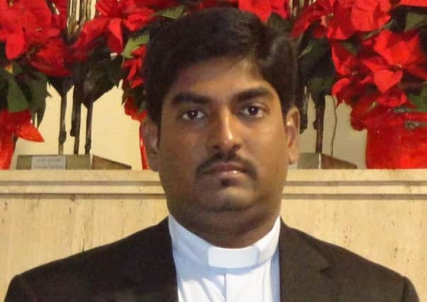 Father Justin Isaac is first Indian priest to serve in Motherwell Diocese.