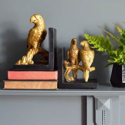 Gold parrot bookends, 42, available from Miafleur.