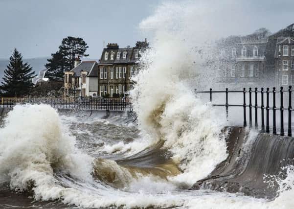 Waves crashed on the sea front at Largs. Picture: PA