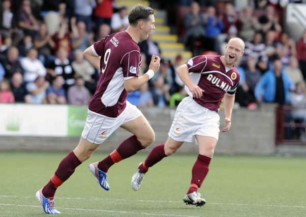 New Clyde signing John Gemmell celebrates after scorng for Stenhousemuir.