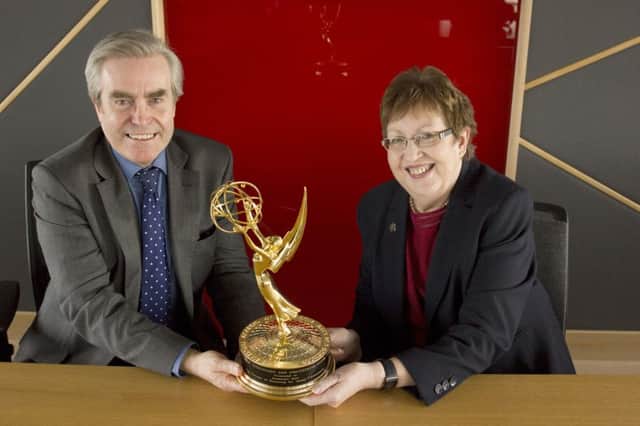 Council Leader Rhondda Geekie with Dr Ivan Ruddock of the Kirkintilloch and District Society of Antiquaries and the Emmy award