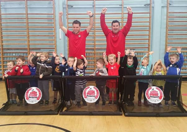 Tom Elliott and Stuart McIntosh with some of the youngsters at Cumbernauld Academy