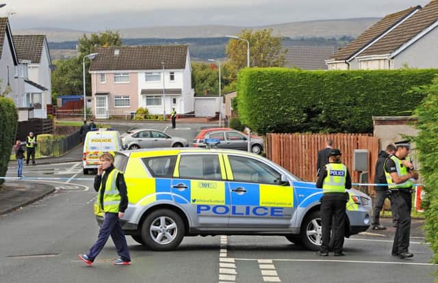 Police attend the scene of the shooting in Bishopbriggs