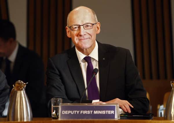 John Swinney, Deputy First Minister & Cabinet Secretary for Finance, Constitution and Economy, Scottish Government. appears before the Devolution Further Powers Committee to give an update on the negotitations for the Scottish fiscal framework. 23 February 2016.  Pic - Andrew Cowan/Scottish Parliament