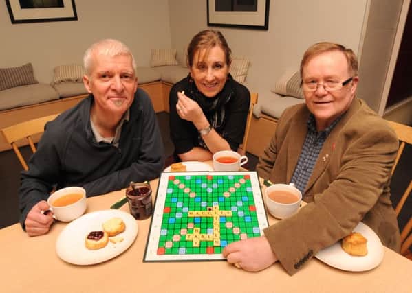 Game players...Scrabble helped Brian Harris, Kirsty Wark and Gordon Gorman launch Maggie's Kitchen Table Day in Glasgow. (Contributed pic)