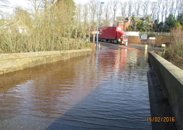Water flooding Garrion Bridge after water main burst