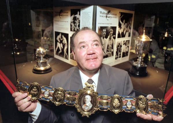 Scottish boxing legend Walter McGowan holding a Lonsdale belt, at an exhibition honouring him at Kelvingrove art gallery in Glasgow in October 1992 (Pic by Donald Macleod)