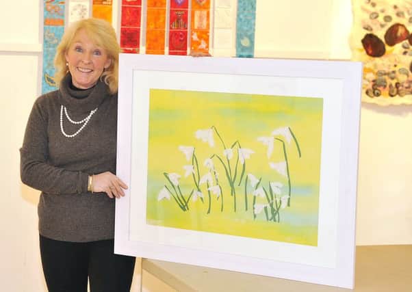 Lillie Art Gallery, Maura McRobbie with her snowdrop embroidery.