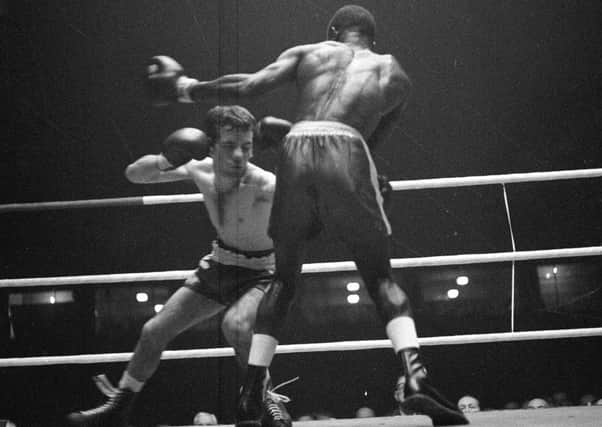 Walter McGowan on the attack during his Commonwealth title win over Killer Solomon in September 1963
