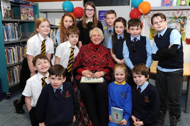 Former makar Liz Lochhead joins local children at Uddingston Library as they recited Scottish poetry. Ã¿The B Flat Miners bring to life Lanarkshires mining past through story and song. Ã¿The audience at the Church of the Nazarene had a great time listening to The B Flat Miners. Ã¿Everyone is given a chance to show their talent during Musicfest at Nigel Gatherers mixed instrument workshops.