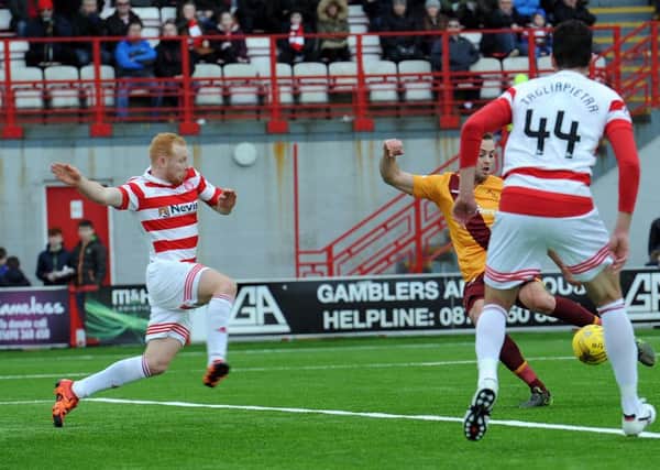 Louis Laing volleys home Motherwell's winning goal against Hamilton (Pic by Alan Watson)