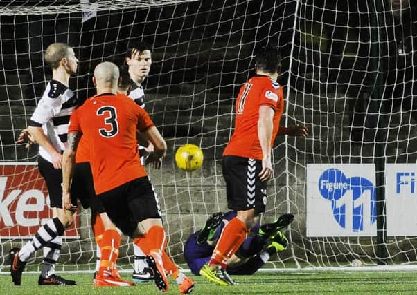 Scott Linton and Sean Higgins look on as David Marsh's header goes in for Clyde's opener