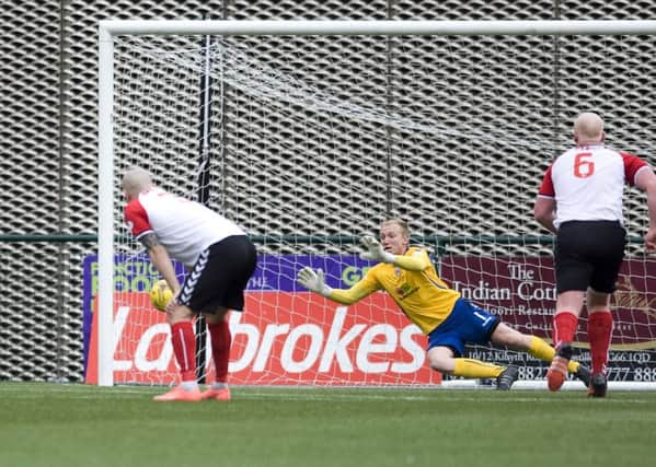 Marc Waters saves Elgin's penalty to earn his side a vita win