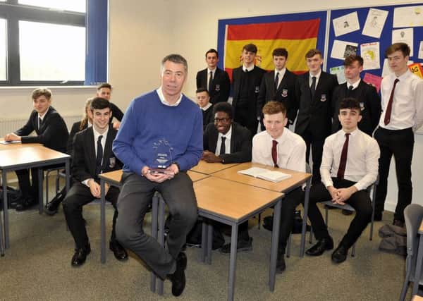 Photo Emma Mitchell 21.3.16
St Ninian's High School, Bill Reside with his award for working with young people.