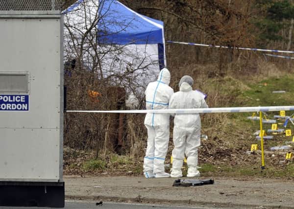 Forensic officers at the scene of the murder on Tuesday. Photo Emma Mitchell 22.3.16