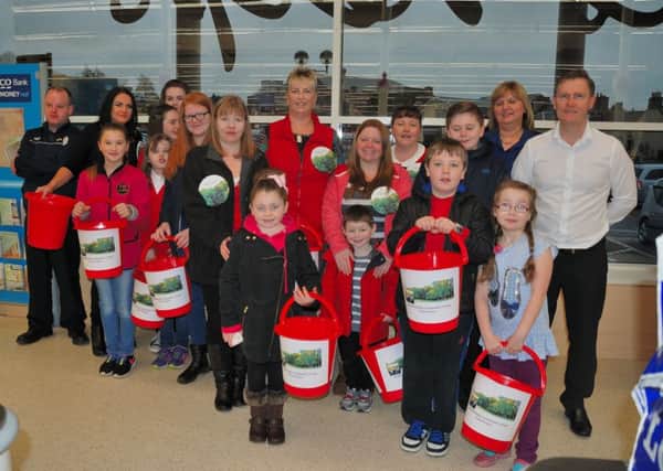 Kirkfieldbank group have also been bag packing at Tesco to raise funds for the new park