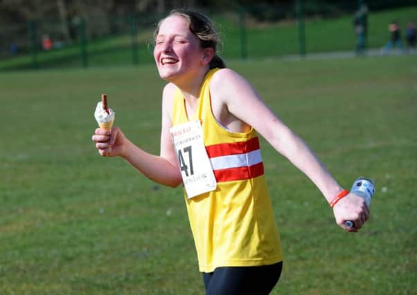 Law 6k runner enjoys an ice cream after last year's race