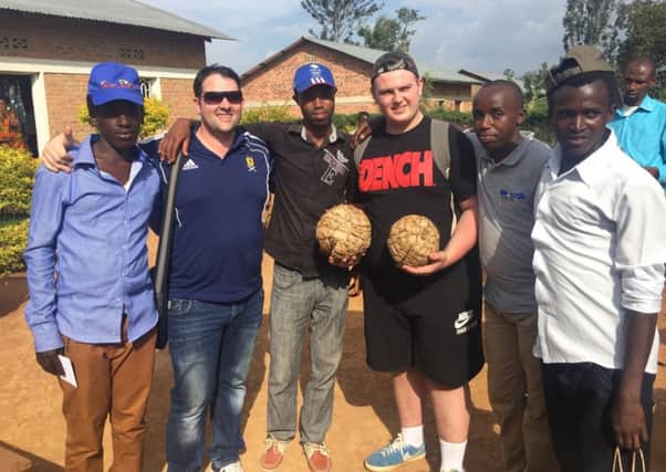 Connor Patterson (wearing the Dench shirt) enjoyed his time in Rwanda