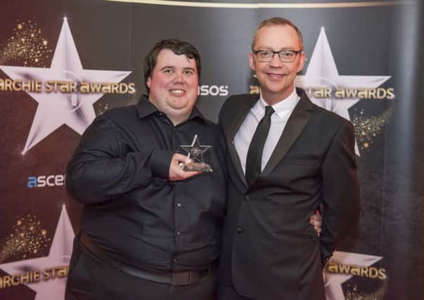 Employee of the Year Marcus Peachy (left) with Ascensos managing director John Devlin