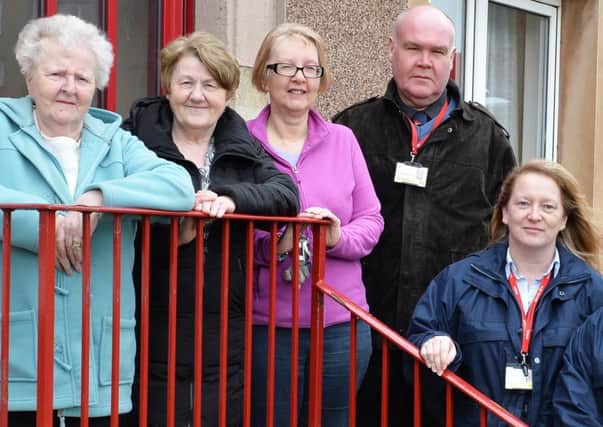 Merry Street residents Anne Bulloch, Julie Dallas and Sheena Cardow with council staff Lesley Lindsay and Sam Bowman on the walkabout.