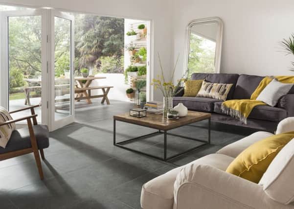 The Spaces Bruges Indoor Grey Tile available from Toppstiles.co.uk. Photo: PA Photo/Handout.