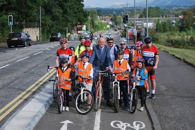 Councillor Alan Moir is here at the opening of the Bears Way Project cycle lanes with Bearsden Primary School pupils and Scottish cycling heroes who competed at the Special Olympics World Games in Los Angeles.