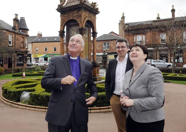Tory leader Ruth Davidson and Uddingston & Bellshill candidate Andy Morrison meet the Rev James Gibson at Bothwell Parish Church.