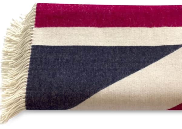 Union flag lambswool blanket, available from the Royal Collection Trust. Photo: PA Photo/Handout