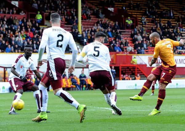 Lionel Ainsworth fires home Motherwell's first half winner in the victory over Hearts on Saturday (Pic by Alan Watson)