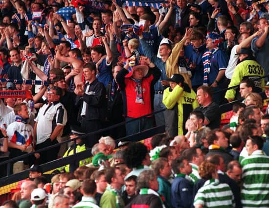 Celtic v Rangers , Hampden Stadium full of supporters from both sides.
