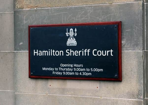 Court heard youth spat at four police officers.
