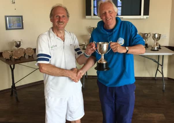 Ian Swann, Milngavie, winner of Scottish Seniors 65s Singles and Doubles Championships with referee John Howie, Whitecraigs.