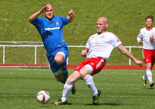 Action from Carluke Rovers' defeat to Vale of Clyde (Pic by Jim Clare)