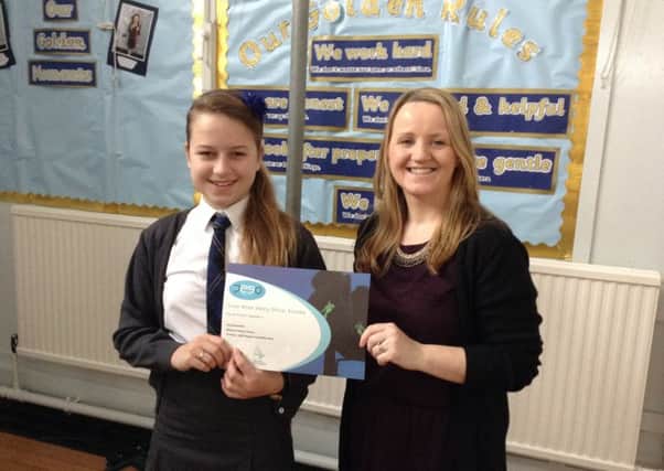 Mossend PS pupil  Skye Brusokaite with Pamela Ferrie, Road Safety Education Officer.