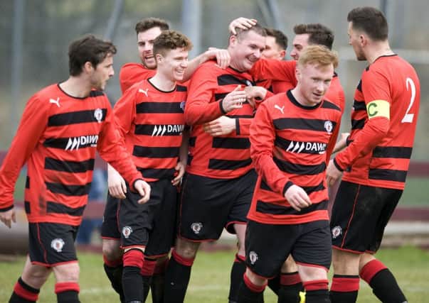 Rob Roy are celebrating their Super League survival