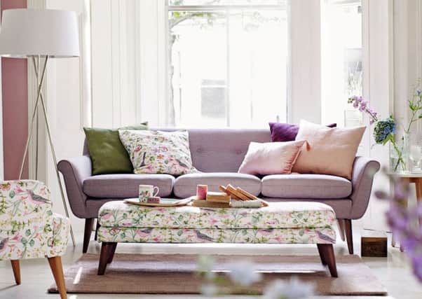 Harper sofa and footstool, and Jocelyn armchair, both in Phoebe Print fabric, available from Marks and Spencer. Photo: PA Photo/Handout