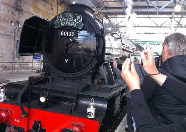 Flying Scotsman arriving in Edinburgh Waverley on Sunday morning