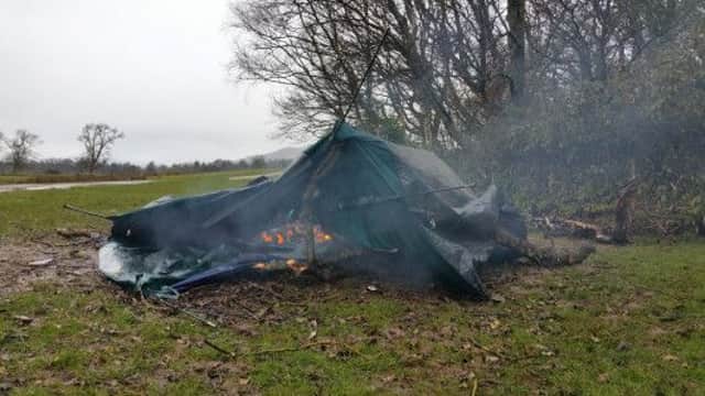 A burning tent near Endrick Water.