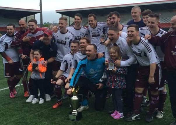 Jubilant Carluke Hearts players pictured after Carluke Hearts' 3-1 victory over North Motherwell AFC in the Lanarkshire Amateur Cup Final at Airdrie's Excelsior Stadium (Submitted pic)