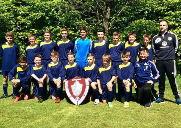 Bearsden Academy's S1 side have won the GSFA Division 5 title and the Castle Cup