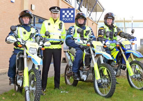 Kirkintilloch Police HQ, Constable's Gordon Thomson, Robert CooperWhite and Lorna Watson (L to R on Bikes) with Chief Inspector Craig Smith.
