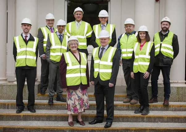 East Dunbartonshire councillors and officials are pictured here with staff from Clark Contracts, Mast Architects and the director at hub West Scotland.