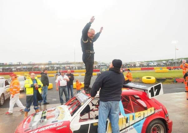 Kenny Purdie celebrates his Lochgelly triumph on top of his car (Submitted pic)