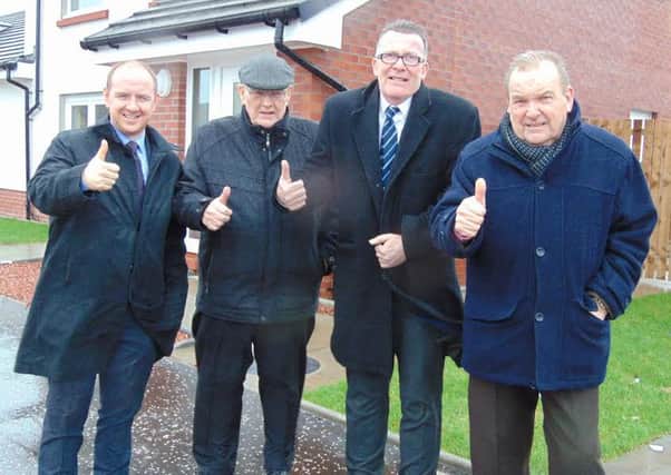 Harry McGuigan, far right, and fellow Labour councillors celebrate a new council housing development in Bellshill earlier this year.