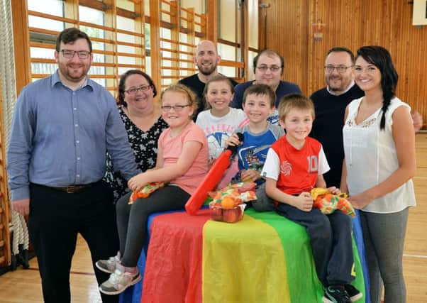 Councillor Paul Kelly with families and holiday lunch club organisers