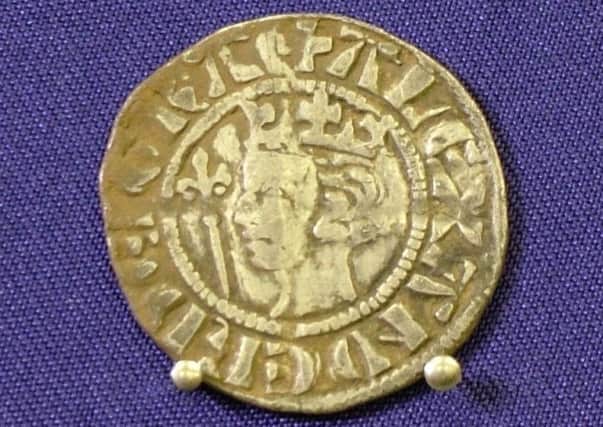 One of the coins in the Bonnington Hoard, an Alexander III of Scotland silver penny.