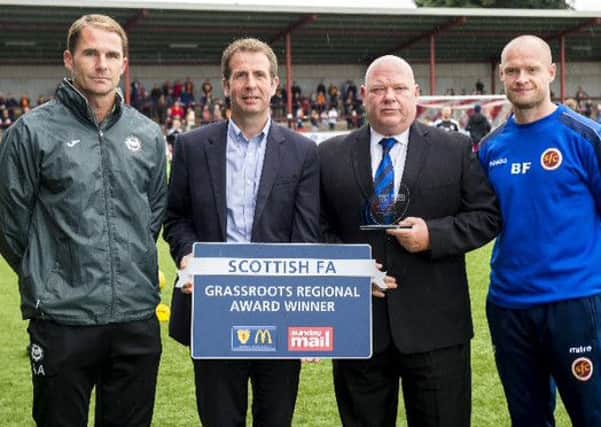 Billy receives his award from Elliot Jardine of McDonalds. With them are Partick Thistlle boss Alan Archibald and Stenhousemuir manager Brown Ferguson.