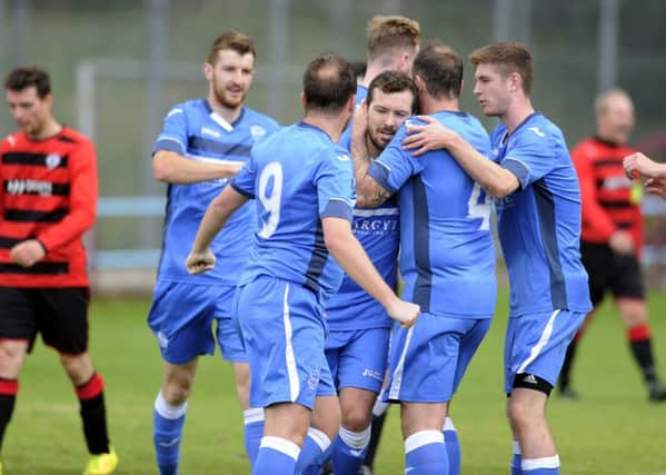 Kilsyth celebrate Frannie Kelly's opener but Rob Rob hit back to win.