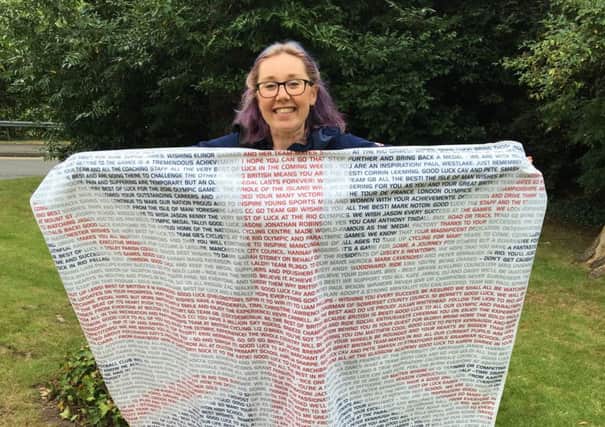 Katie Archibald with a special good luck flag she received before setting out for Rio.