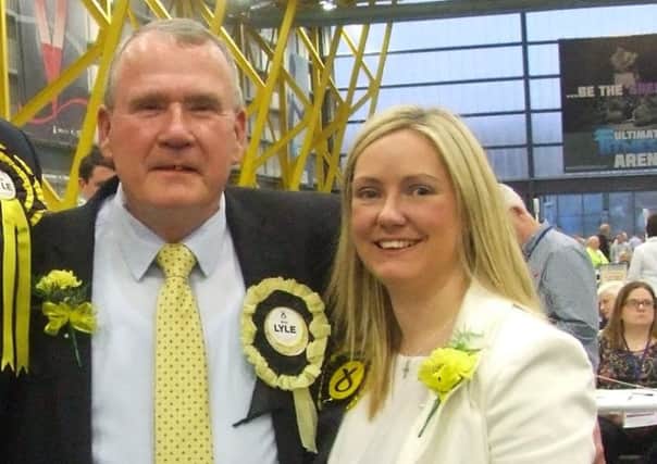 Richard Lyle and daughter Marina celebrate election success.